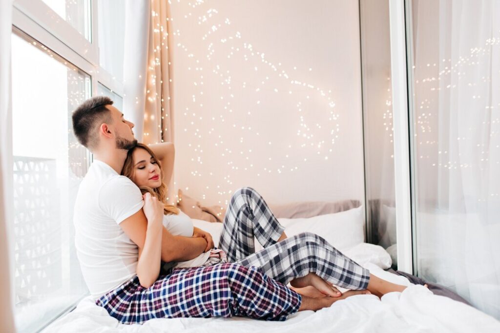 sleepy caucasian woman posing bed morning tired girl pajama lying near her boyfriend 197531 8324