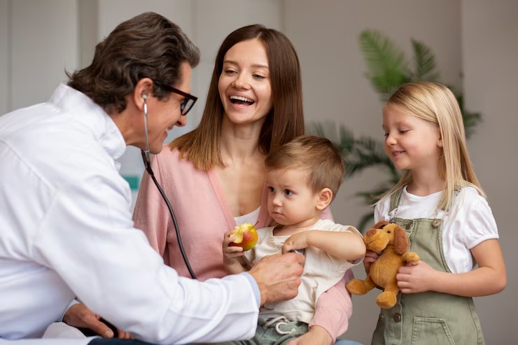 young mother with her children pediatrician appointment 23 2149187458